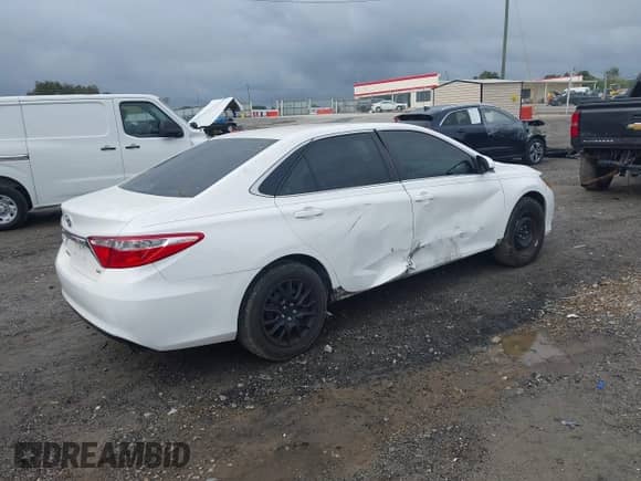 2015 Toyota Camry LE with VIN 4T1BF1FK9FU902181, listed as a IAAI auction lot 43376033 with 165,678 mi miles and . Bid and sale history available at DreamBid. Image 4.