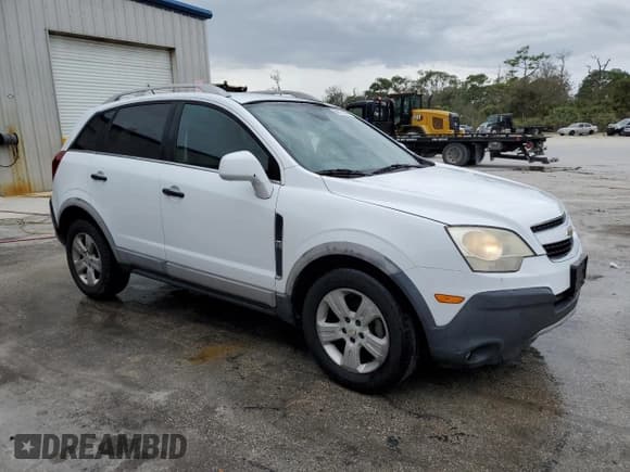 ✅ 2014 Chevrolet Captiva Sport LS • VIN: 3GNAL2EKXES606883 • Lot: 88721845. Wystawiony na Copart z przebiegiem 210 934 mil. Bezpłatny archiwum sprzedaży aukcyjnych z USA i szczegółowy raport historii pojazdu na DreamBid. Zdjęcie 4.