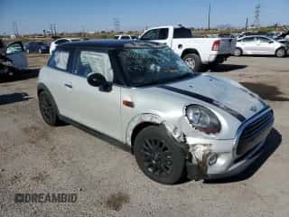 2017 MINI Hardtop Cooper with VIN WMWXP5C34H2F61072, listed as a Copart auction lot 57314695 with 46,693 mi miles and Salvage title. Bid and sale history available at DreamBid. Image 4.