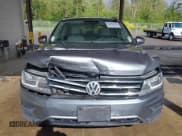 ✅ 2018 Volkswagen Tiguan SEL • VIN: 3VV3B7AX6JM054849 • Лот: 42303112. Опубликован ранее на IAAI с пробегом 87 574 миль. Бесплатный доступ к архиву аукционных продаж из США и подробный отчёт об истории автомобиля на DreamBid. Изображение 12.