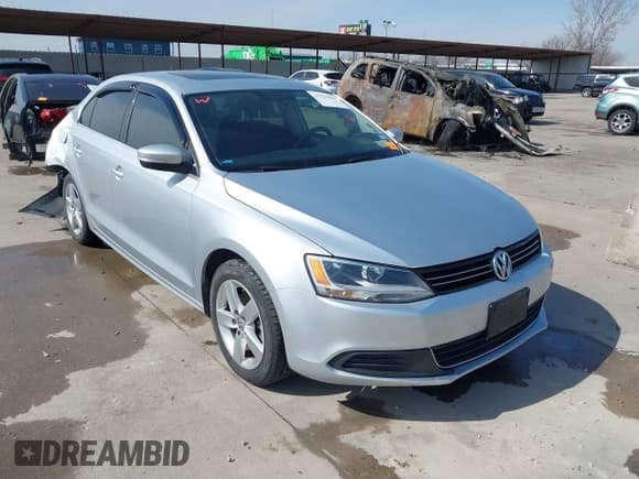 ✅ 2014 Volkswagen Jetta TDI w/Premium • VIN: 3VWLL7AJ6EM424935 • Лот: 41533634. Опубликован ранее на IAAI с пробегом 64 028 миль. Бесплатный доступ к архиву аукционных продаж из США и подробный отчёт об истории автомобиля на DreamBid. Изображение 1.