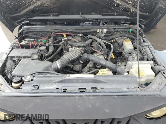 ✅ 2007 Jeep Wrangler X • VIN: 1J4GA39127L119471 • Lot: 65737835. Wystawiony na Copart z przebiegiem 174 080 mil. Bezpłatny archiwum sprzedaży aukcyjnych z USA i szczegółowy raport historii pojazdu na DreamBid. Zdjęcie 11.