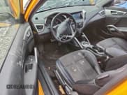 ✅ 2013 Hyundai Veloster w/Black Int • VIN: KMHTC6AD0DU176324 • Lot: 85412185. Listed on Copart with 135,582 mi. Free auction sales archive from the USA and detailed vehicle history report at DreamBid. Image 8.