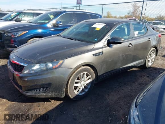 ✅ 2011 Kia Optima LX • VIN: KNAGM4A7XB5108912 • Lot: 43620286. Listed on IAAI with 123,900 mi. Free auction sales archive from the USA and detailed vehicle history report at DreamBid. Image 2.