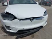 ✅ 2021 Tesla Model X Long Range Plus • VIN: 5YJXCDE27MF322200 • Lot: 42360282. Listed on IAAI with 37,072 mi. Free auction sales archive from the USA and detailed vehicle history report at DreamBid. Image 6.