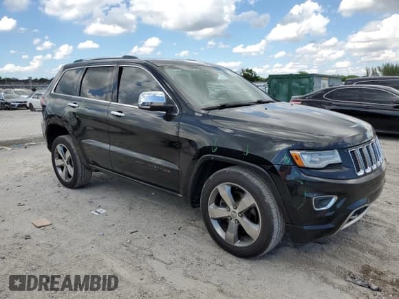 ✅ 2014 Jeep Grand Cherokee Overland • VIN: 1C4RJFCT2EC177961 • Lot: 85732645. Listed on Copart with 126,132 mi. Free auction sales archive from the USA and detailed vehicle history report at DreamBid. Image 4.