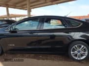 ✅ 2016 Ford Fusion SE Hybrid • VIN: 3FA6P0LU3GR127202 • Lot: 43061240. Wystawiony na IAAI z przebiegiem 196 916 mil. Bezpłatny archiwum sprzedaży aukcyjnych z USA i szczegółowy raport historii pojazdu na DreamBid. Zdjęcie 14.