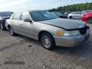 ✅ 2001 Lincoln Town Car Signature • VIN: 1LNHM82W81Y611688 • Lot: 43062033. Listed on IAAI with 160,746 mi. Free auction sales archive from the USA and detailed vehicle history report at DreamBid. Image 1.
