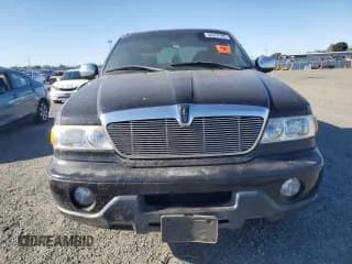 ✅ 2002 Lincoln Blackwood • VIN: 5LTEW05A42KJ02248 • Лот: 56076795. Опубликован ранее на Copart с пробегом Не указан. Бесплатный доступ к архиву аукционных продаж из США и подробный отчёт об истории автомобиля на DreamBid. Изображение 5.