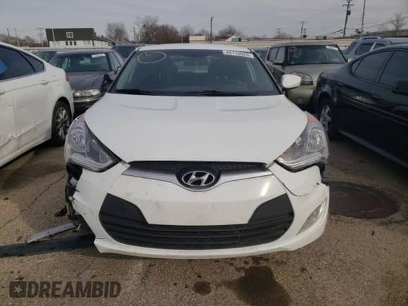 2017 Hyundai Veloster z VIN KMHTC6AD8HU310860, wystawiony jako Copart lot #42170923 z przebiegiem 97 009 mil mil oraz . Historia ofert i sprzedaży dostępna na DreamBid. Obrazek 5.