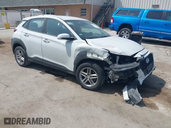 2019 Hyundai Kona SE z VIN KM8K12AA3KU282781, wystawiony jako IAAI lot #42518967 z przebiegiem 73 174 mil mil oraz . Historia ofert i sprzedaży dostępna na DreamBid. Obrazek 1.