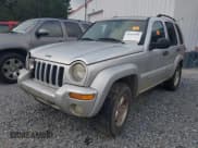 ✅ 2004 Jeep Liberty Limited • VIN: 1J4GK58K34W159121 • Lot: 42534196. Listed on IAAI with 163,070 mi. Free auction sales archive from the USA and detailed vehicle history report at DreamBid. Image 2.