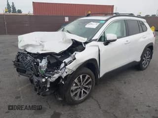 ✅ 2023 Toyota Corolla Cross XLE • VIN: 7MUDAAAG2PV047060 • Lot: 43410775. Listed on IAAI with 7,917 mi. Free auction sales archive from the USA and detailed vehicle history report at DreamBid. Image 2.