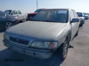 ✅ 1999 Infiniti G20 • VIN: JNKCP11AXXT003713 • Lot: 40167487. Listed on IAAI with 244,355 mi. Free auction sales archive from the USA and detailed vehicle history report at DreamBid. Image 6.