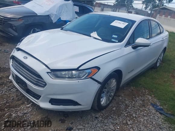 ✅ 2014 Ford Fusion S Hybrid • VIN: 3FA6P0UUXER360070 • Лот: 42761783. Опубликован ранее на IAAI с пробегом 389 817 миль. Бесплатный доступ к архиву аукционных продаж из США и подробный отчёт об истории автомобиля на DreamBid. Изображение 2.