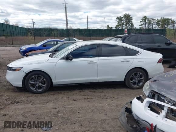 2023 Honda Accord EX-L with VIN 1HGCY2F60PA012071, listed as a IAAI auction lot 42005500 with 29,858 mi miles and . Bid and sale history available at DreamBid. Image 14.