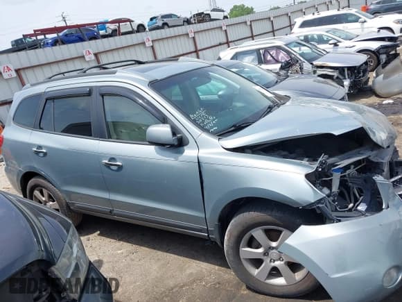 ✅ 2009 Hyundai Santa Fe SE • VIN: 5NMSH13E19H281365 • Лот: 42276330. Опубликован ранее на IAAI с пробегом 164 562 миль. Бесплатный доступ к архиву аукционных продаж из США и подробный отчёт об истории автомобиля на DreamBid. Изображение 13.