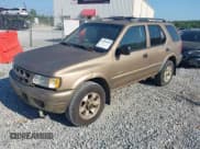 ✅ 2001 Isuzu Rodeo S • VIN: 4S2CK58W714300131 • Lot: 42993854. Wystawiony na IAAI z przebiegiem 332 181 mil. Bezpłatny archiwum sprzedaży aukcyjnych z USA i szczegółowy raport historii pojazdu na DreamBid. Zdjęcie 2.