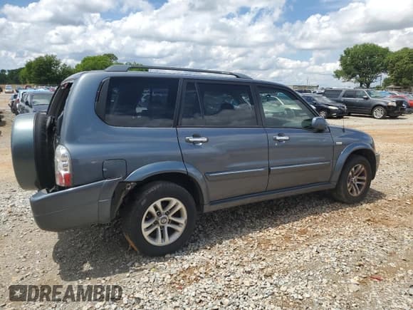 ✅ 2005 Suzuki XL7 LX • VIN: JS3TY92VX54102488 • Lot: 56700595. Wystawiony na Copart z przebiegiem 169 827 mil. Bezpłatny archiwum sprzedaży aukcyjnych z USA i szczegółowy raport historii pojazdu na DreamBid. Zdjęcie 3.