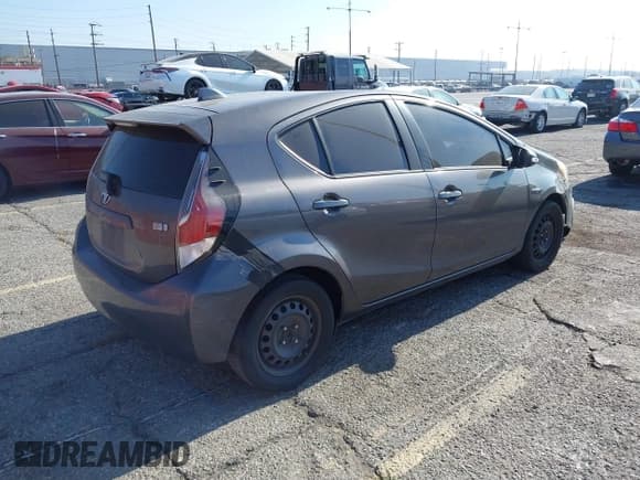 ✅ 2016 Toyota Prius One • VIN: JTDKDTB37G1132974 • Lot: 42865095. Listed on IAAI with 511,398 mi. Free auction sales archive from the USA and detailed vehicle history report at DreamBid. Image 4.