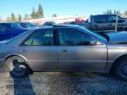 ✅ 1997 Cadillac Seville STS • VIN: 1G6KY5298VU810473 • Lot: 43444629. Listed on IAAI with 71,575 mi. Free auction sales archive from the USA and detailed vehicle history report at DreamBid. Image 13.