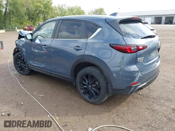 ✅ 2023 Mazda CX-5 S Carbon Edition • VIN: JM3KFBCM9P0167900 • Lot: 43291236. Wystawiony na IAAI z przebiegiem 40 306 mil. Bezpłatny archiwum sprzedaży aukcyjnych z USA i szczegółowy raport historii pojazdu na DreamBid. Zdjęcie 3.