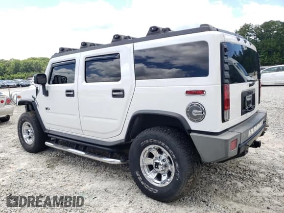 ✅ 2006 Hummer H2 • VIN: 5GRGN23U86H107073 • Lot: 60492145. Wystawiony na Copart z przebiegiem 138 958 mil. Bezpłatny archiwum sprzedaży aukcyjnych z USA i szczegółowy raport historii pojazdu na DreamBid. Zdjęcie 2.