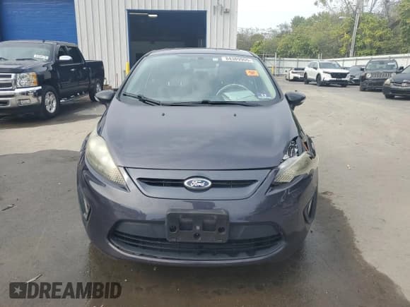 ✅ 2013 Ford Fiesta Titanium • VIN: 3FADP4FJ8DM142772 • Lot: 84389905. Wystawiony na Copart z przebiegiem 129 820 mil. Bezpłatny archiwum sprzedaży aukcyjnych z USA i szczegółowy raport historii pojazdu na DreamBid. Zdjęcie 5.