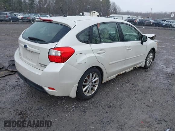 ✅ 2012 Subaru Impreza Premium • VIN: JF1GPAC61CH228262 • Lot: 43804230. Listed on IAAI with 131,568 mi. Free auction sales archive from the USA and detailed vehicle history report at DreamBid. Image 4.
