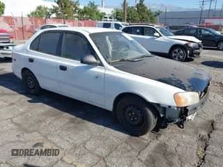 2002 Hyundai Accent GL z VIN KMHCG45C42U375352, wystawiony jako IAAI lot #42699297 z przebiegiem 103 540 mil mil oraz . Historia ofert i sprzedaży dostępna na DreamBid. Obrazek 1.
