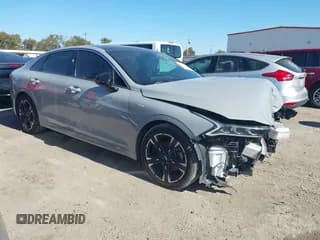 ✅ 2021 Kia K5 GT-Line • VIN: 5XXG64J20MG046582 • Лот: 43655287. Опубликован ранее на IAAI с пробегом 82 763 миль. Бесплатный доступ к архиву аукционных продаж из США и подробный отчёт об истории автомобиля на DreamBid. Изображение 1.