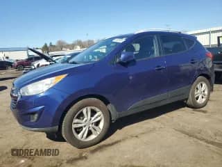 2011 Hyundai Tucson Limited with VIN KM8JUCAC3BU244297, listed as a Copart auction lot 48629585 with 208,270 mi miles and Salvage title. Bid and sale history available at DreamBid. Image 1.