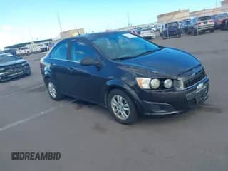 2014 Chevrolet Sonic LT with VIN 1G1JC5SB1E4211062, listed as a IAAI auction lot 43200565 with 103,942 mi miles and . Bid and sale history available at DreamBid. Image 1.