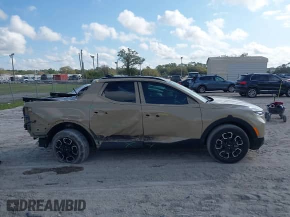 2024 Hyundai Santa Cruz SEL с VIN 5NTJC4DE0RH107074, выставлен на аукционе IAAI как лот 41546728 с пробегом 2 289 миль миль и . История ставок и продаж доступна на DreamBid. Изображение 14.