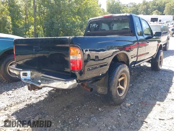 ✅ 1999 Toyota Tacoma • VIN: 4TAWN72N2XZ402410 • Lot: 43064918. Listed on IAAI with 260,924 mi. Free auction sales archive from the USA and detailed vehicle history report at DreamBid. Image 4.