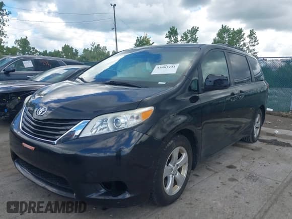 ✅ 2014 Toyota Sienna LE AAS • VIN: 5TDKK3DC4ES488897 • Lot: 43083441. Listed on IAAI with 127,469 mi. Free auction sales archive from the USA and detailed vehicle history report at DreamBid. Image 2.