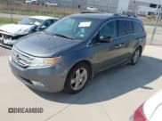 ✅ 2012 Honda Odyssey Touring • VIN: 5FNRL5H97CB501620 • Лот: 43005068. Опубликован ранее на IAAI с пробегом 160 233 миль. Бесплатный доступ к архиву аукционных продаж из США и подробный отчёт об истории автомобиля на DreamBid. Изображение 2.