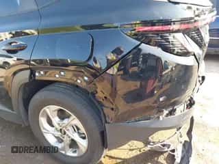 2022 Hyundai Tucson SEL with VIN 5NMJB3AE3NH133093, listed as a IAAI auction lot 43159380 with 33,721 mi miles and . Bid and sale history available at DreamBid. Image 6.