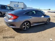 ✅ 2018 Honda Civic Touring • VIN: 19XFC1F95JE001392 • Lot: 87070235. Listed on Copart with 80,915 mi. Free auction sales archive from the USA and detailed vehicle history report at DreamBid. Image 3.