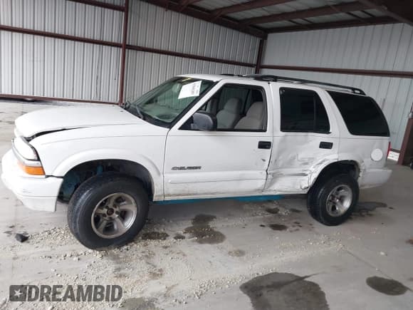 ✅ 2004 Chevrolet Blazer LS • VIN: 1GNDT13X64K129093 • Lot: 41860109. Wystawiony na IAAI z przebiegiem 175 588 mil. Bezpłatny archiwum sprzedaży aukcyjnych z USA i szczegółowy raport historii pojazdu na DreamBid. Zdjęcie 14.