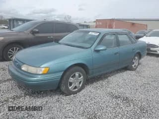 ✅ 1993 Ford Taurus GL • VIN: 1FALP5245PA272575 • Lot: 51271045. Listed on Copart with 95,380 mi. Free auction sales archive from the USA and detailed vehicle history report at DreamBid. Image 1.