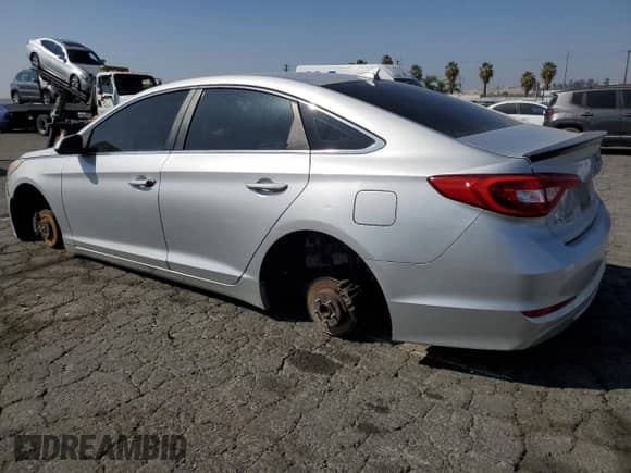 2015 Hyundai Sonata SE с VIN 5NPE24AF5FH156055, выставлен на аукционе Copart как лот 82364145 с пробегом 112 411 миль миль и Списание • Salvage title. История ставок и продаж доступна на DreamBid. Изображение 2.