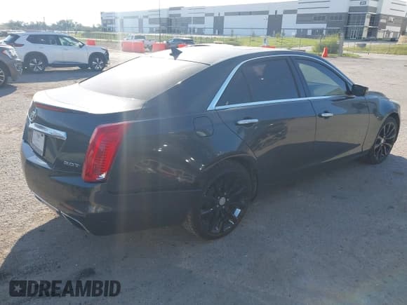 ✅ 2014 Cadillac CTS Luxury RWD • VIN: 1G6AR5SX5E0193905 • Lot: 43399010. Listed on IAAI with 115,555 mi. Free auction sales archive from the USA and detailed vehicle history report at DreamBid. Image 4.