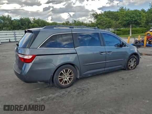 ✅ 2013 Honda Odyssey EX-L • VIN: 5FNRL5H68DB012151 • Lot: 96378035. Wystawiony na Copart z przebiegiem 193 993 mil. Bezpłatny archiwum sprzedaży aukcyjnych z USA i szczegółowy raport historii pojazdu na DreamBid. Zdjęcie 3.