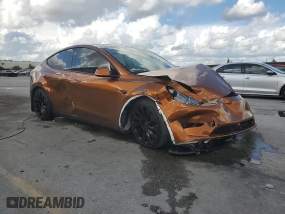 ✅ 2022 Tesla Model Y Performance • VIN: 7SAYGDEF4NF529899 • Lot: 89920025. Listed on Copart with 60,303 mi. Free auction sales archive from the USA and detailed vehicle history report at DreamBid. Image 4.