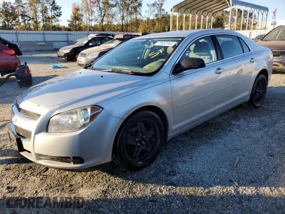 ✅ 2012 Chevrolet Malibu 1LS • VIN: 1G1ZB5E09CF357419 • Lot: 75650164. Listed on Copart with 150,496 mi. Free auction sales archive from the USA and detailed vehicle history report at DreamBid. Image 1.