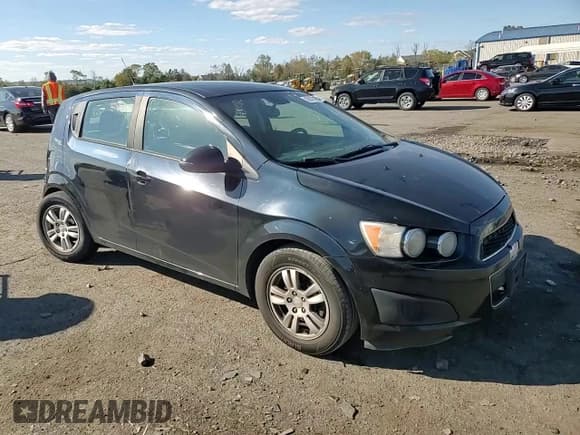✅ 2012 Chevrolet Sonic LS • VIN: 1G1JB6SH5C4213911 • Lot: 82407995. Listed on Copart with 214,419 mi. Free auction sales archive from the USA and detailed vehicle history report at DreamBid. Image 13.