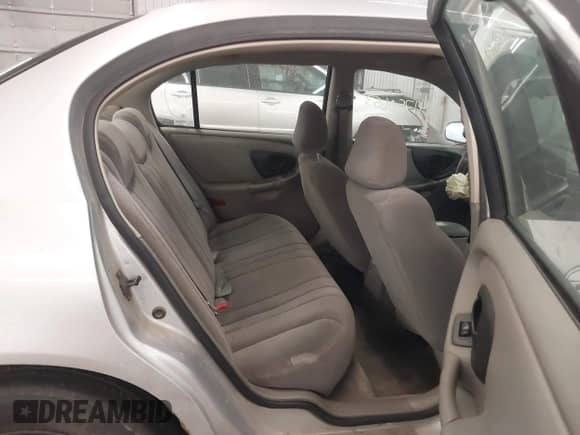 2003 Chevrolet Malibu z VIN 1G1ND52J73M536270, wystawiony jako IAAI lot #41750653 z przebiegiem 128 005 mil mil oraz . Historia ofert i sprzedaży dostępna na DreamBid. Obrazek 8.