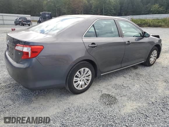 2014 Toyota Camry SE with VIN 4T1BF1FK7EU767216, listed as a Copart auction lot 85265055 with 173,390 mi miles and Salvage title. Bid and sale history available at DreamBid. Image 3.