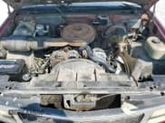 ✅ 1990 GMC Sierra 1500 • VIN: 2GTEC19K5L1508982 • Лот: 81121715. Опубликован ранее на Copart с пробегом 332 358 миль. Бесплатный доступ к архиву аукционных продаж из США и подробный отчёт об истории автомобиля на DreamBid. Изображение 11.